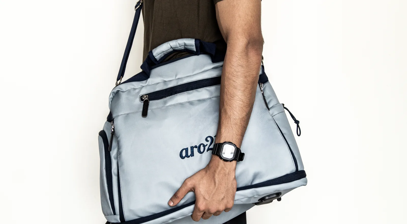 Slate Duffel carried by hand, front view