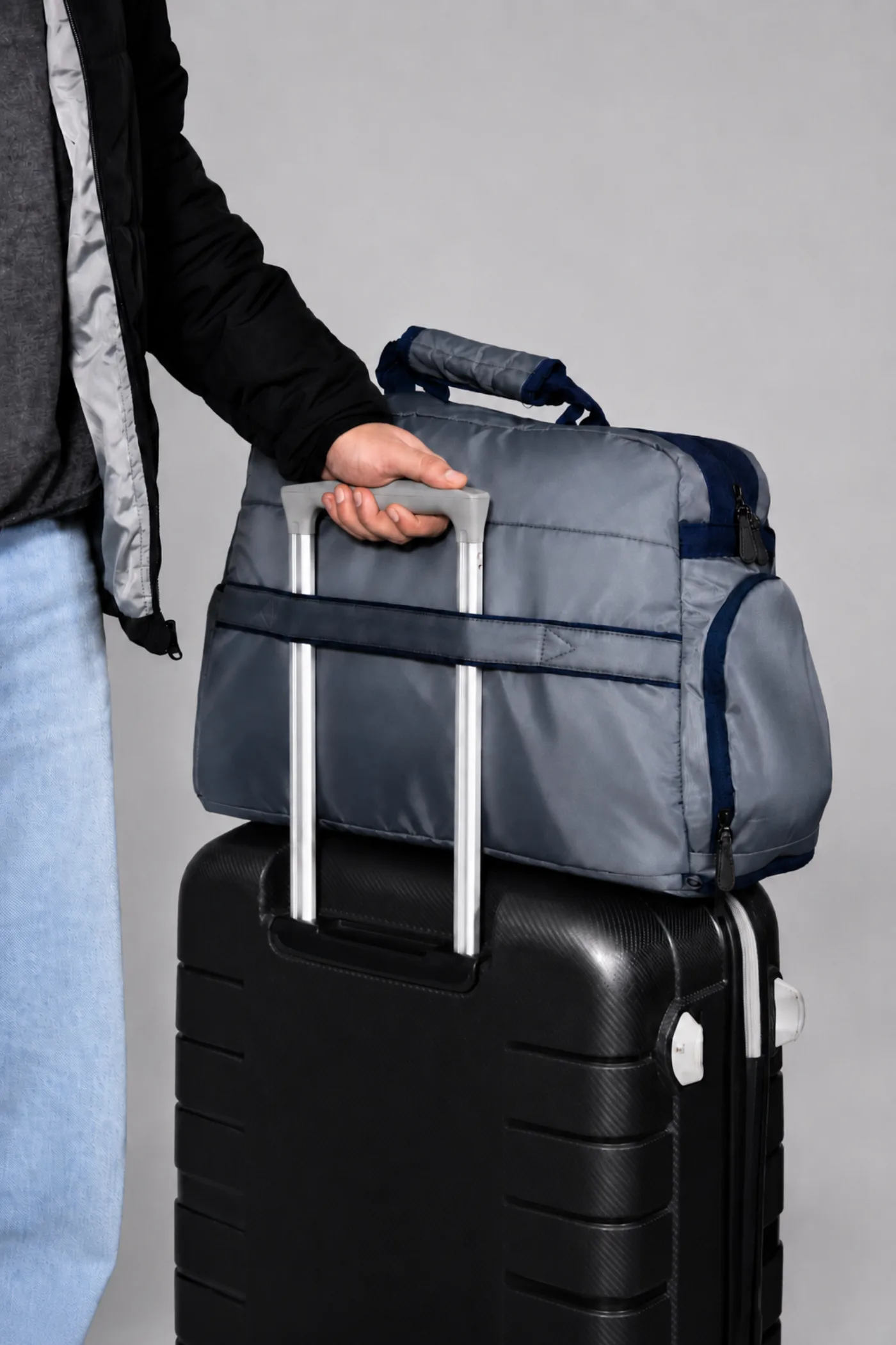Slate Duffel, carried through the airport