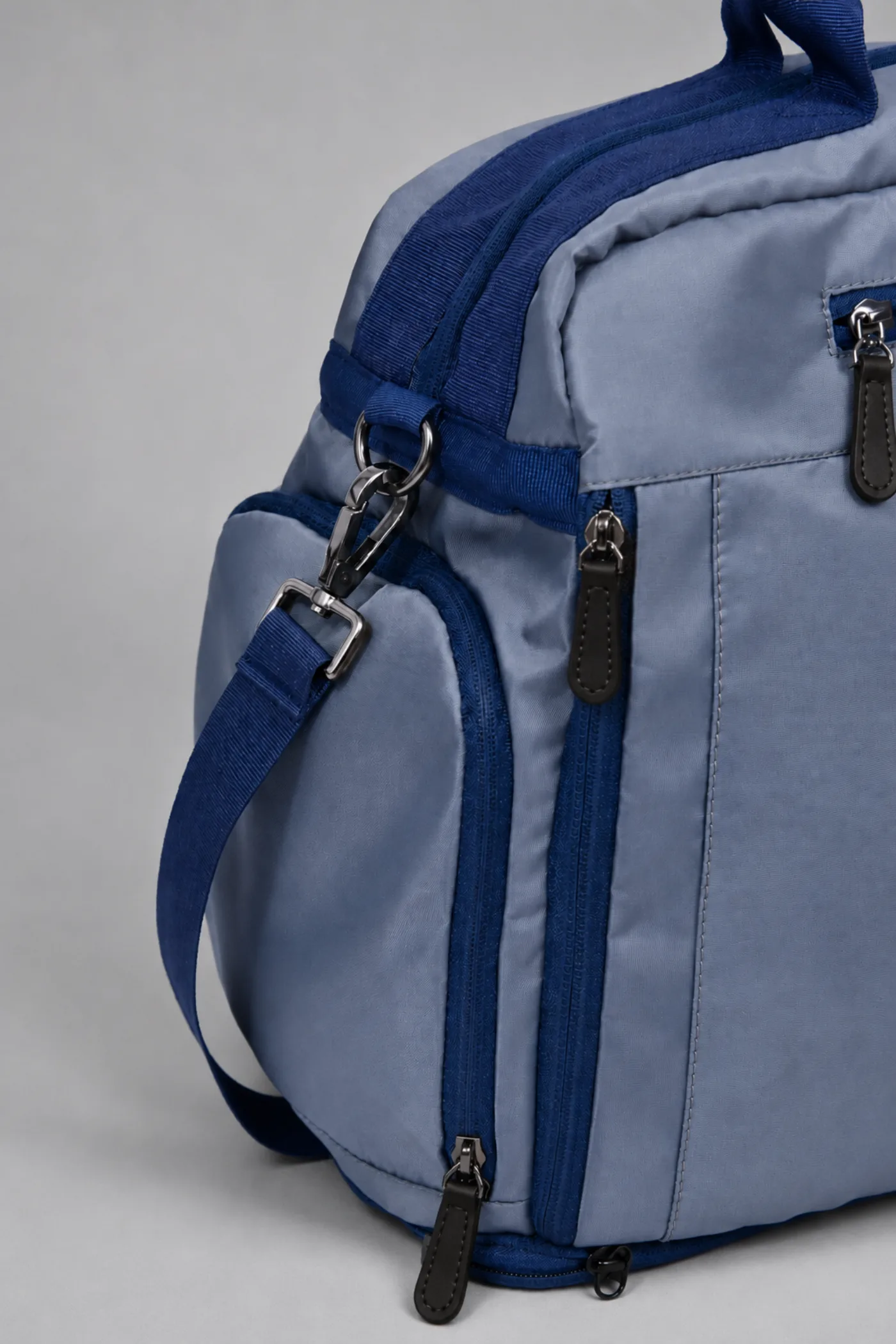 Black nickel hardware and zipper detail